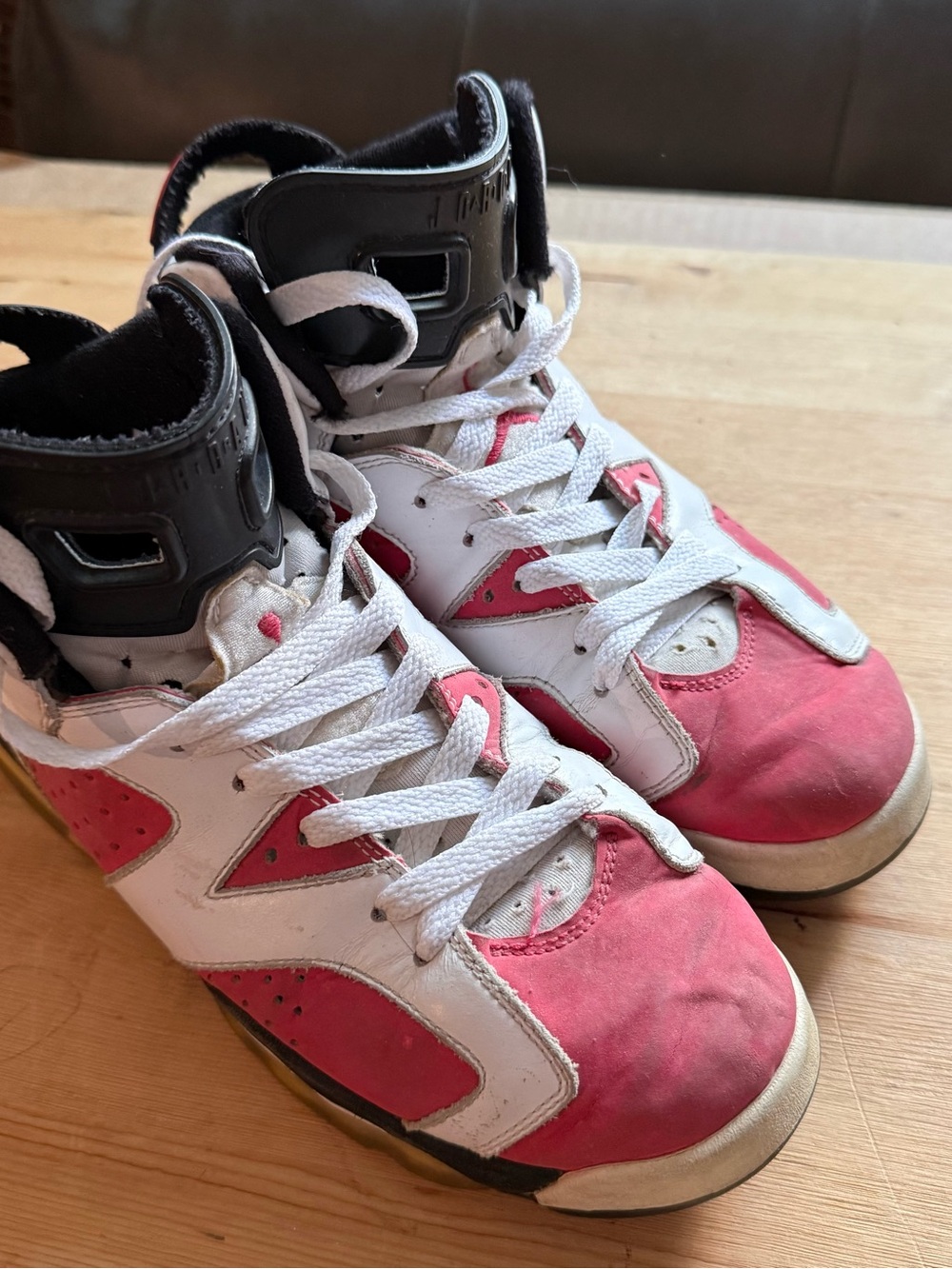Air Jordan Pink and White High-Top Athletic Shoes